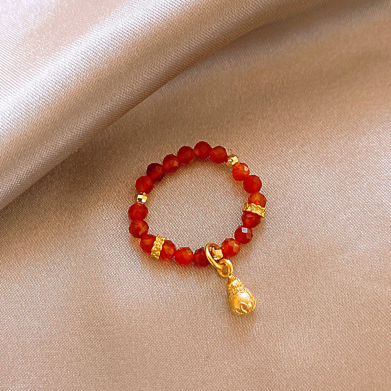 AUR 沙金ビーズリング｜弾力のある華やかモチーフ