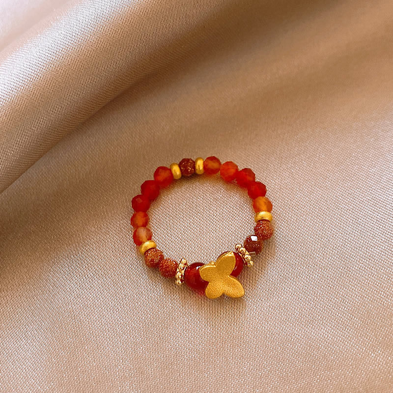 AUR 沙金ビーズリング｜弾力のある華やかモチーフ